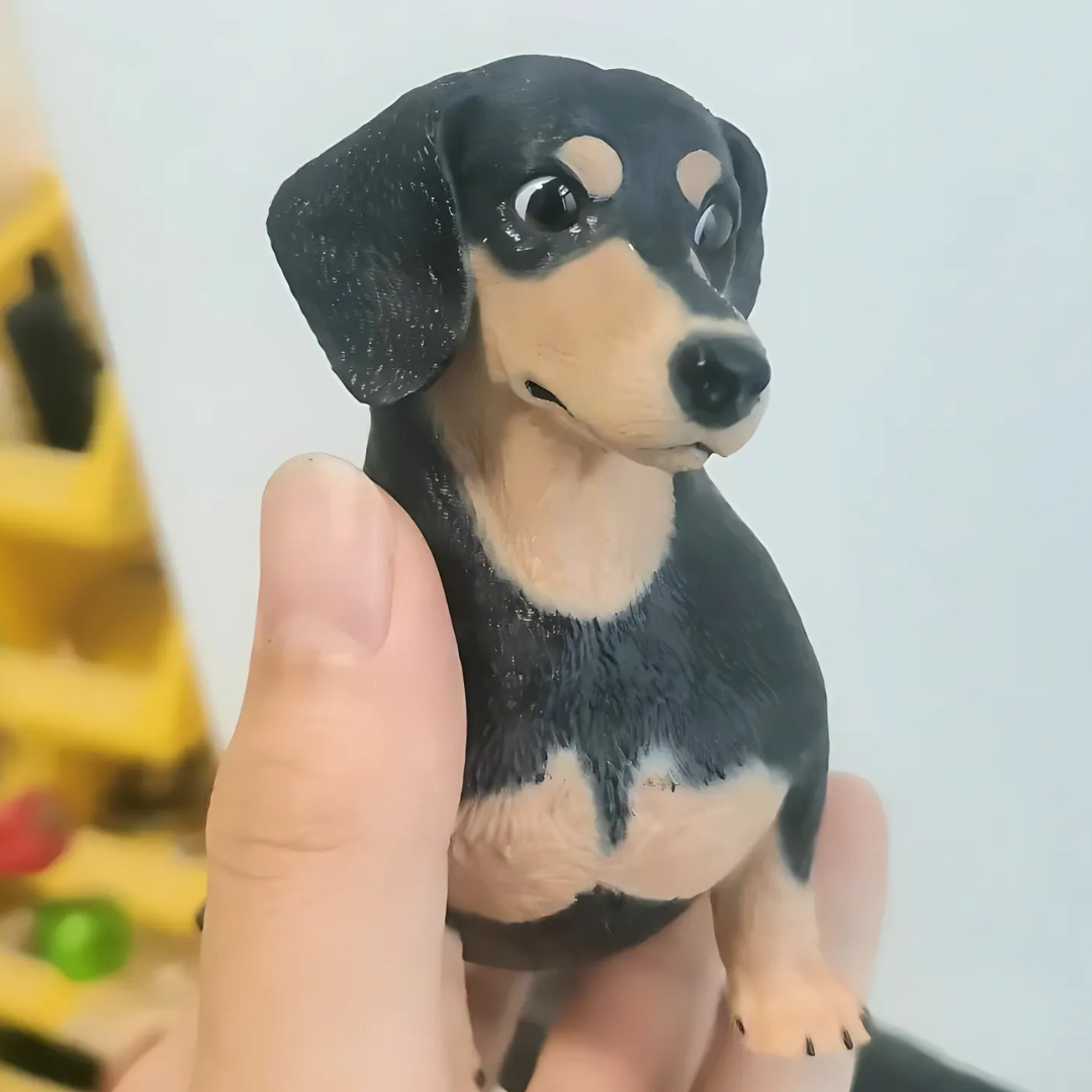 Front view of custom 3D printed black-yellow pet dachshund dog statue anniversary and birthday gift